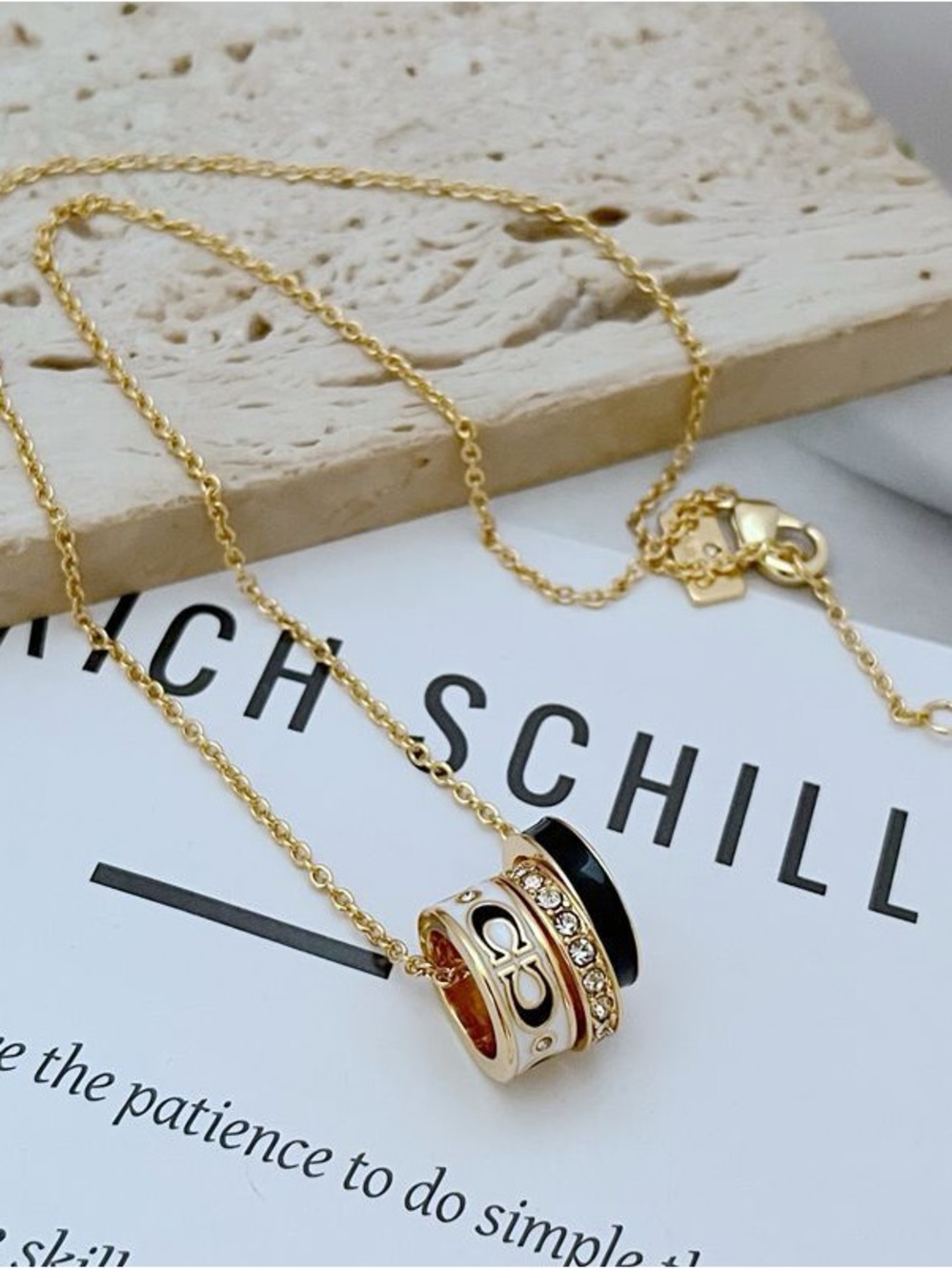 Coach Gold Necklace with Black Enamel & Crystal Ring Pendant